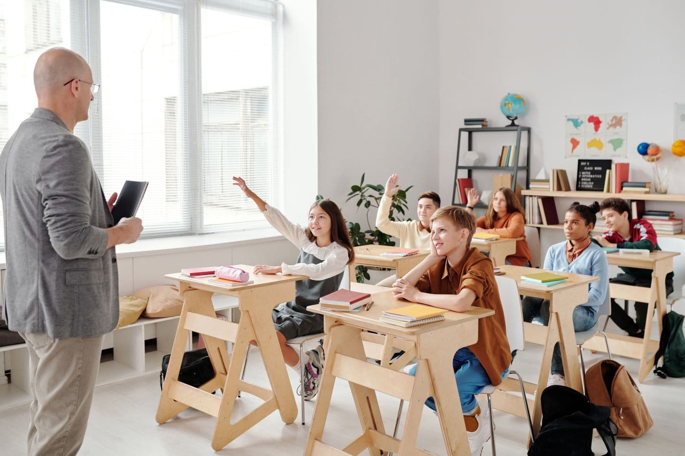 A² After School learning space in Jounieh with wood desks and plants