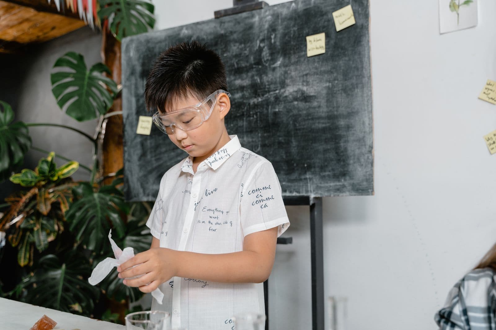 Student in a hands-on science activity during after school in Jounieh